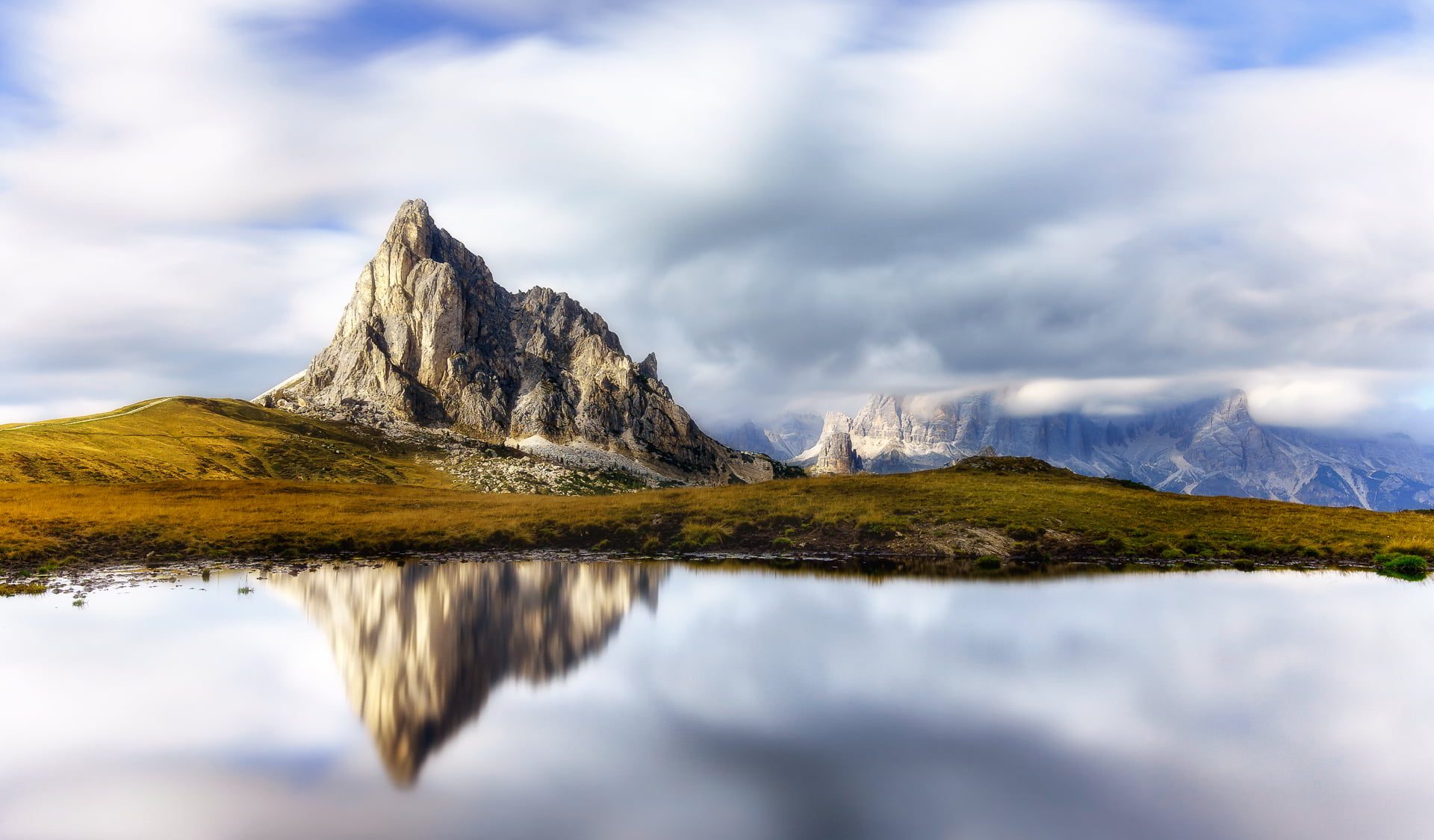 Bilderkarussell_-_1909_Pfütze am Passo